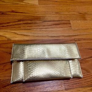 gold faux snake clutch